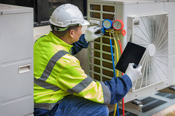 Professional Air Duct Cleaning technician working in Troy, TX